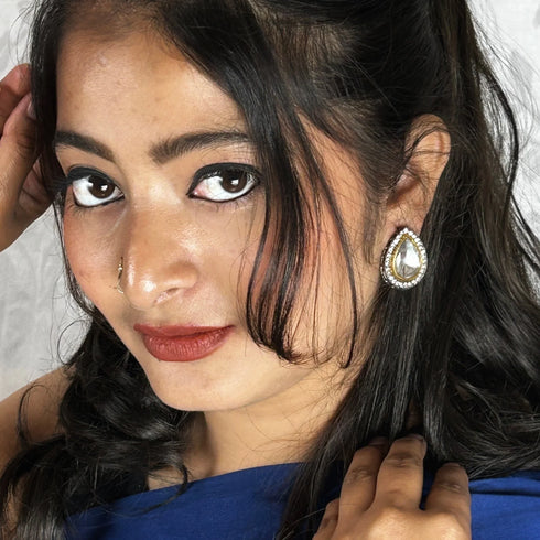 Black Rhodium-Plated Teardrop Studs from Trenzify Store.