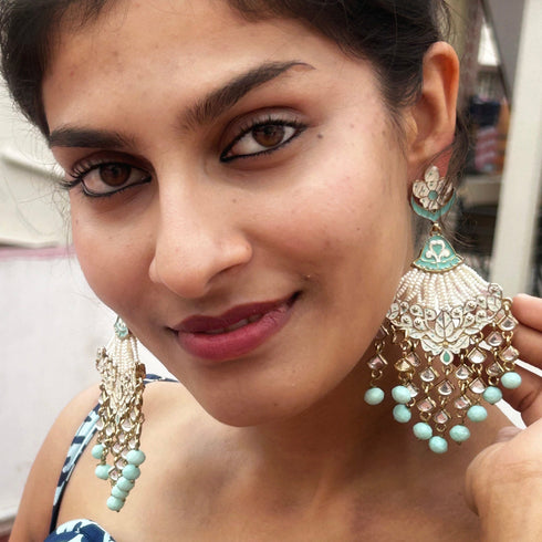 Mint Meenakari Layered Kundan Chandeliers from Trenzify Store.