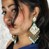 Mint Meenakari Layered Kundan Chandeliers from Trenzify Store.