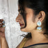 Meenakari Blossom Jhumka Earrings from Trenzify Store.
