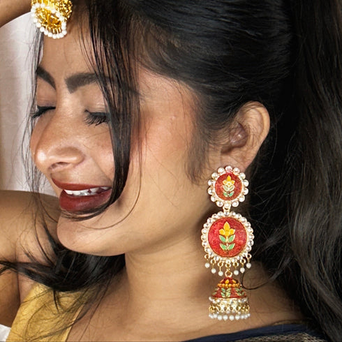 Vibrant Bloom Meenakari Jhumka Earrings from Trenzify Store.