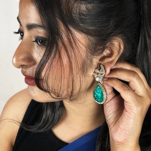 Peacock Radiance Kundan Drop Earrings from Trenzify Store.