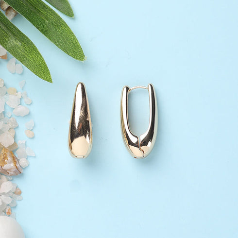 Anti Tarnish Sleek Elongated Gold-Tone Hoop Earrings from Trenzify Store.