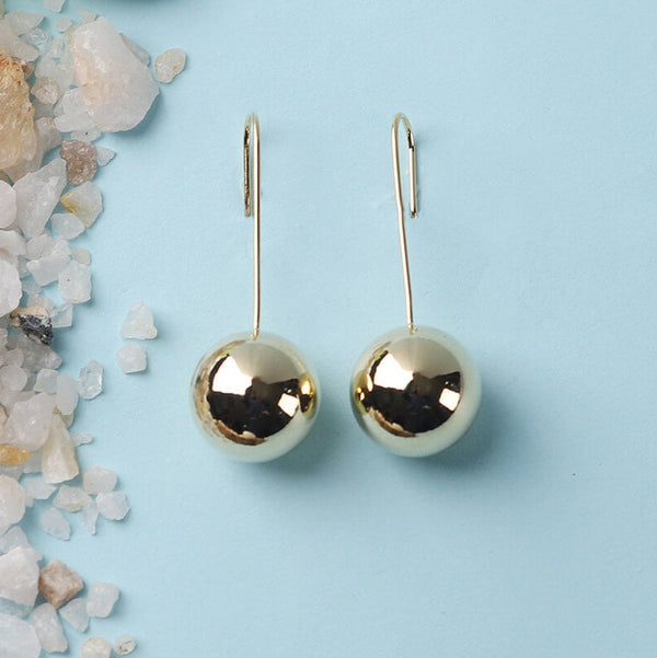 Golden ball drop earrings with hook design, anti-tarnish minimal chic jewelry from Trenzify Store.