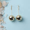 Golden ball drop earrings with hook design, anti-tarnish minimal chic jewelry from Trenzify Store.