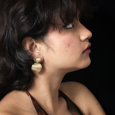 Golden double dome anti-tarnish earrings with ribbed texture, bold statement jewelry from Trenzify Store.