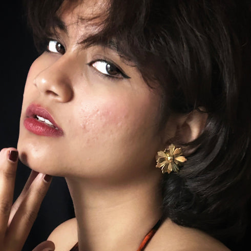 Radiant Daisy-Shaped Gold-Tone Stud Earrings from Trenzify Store.