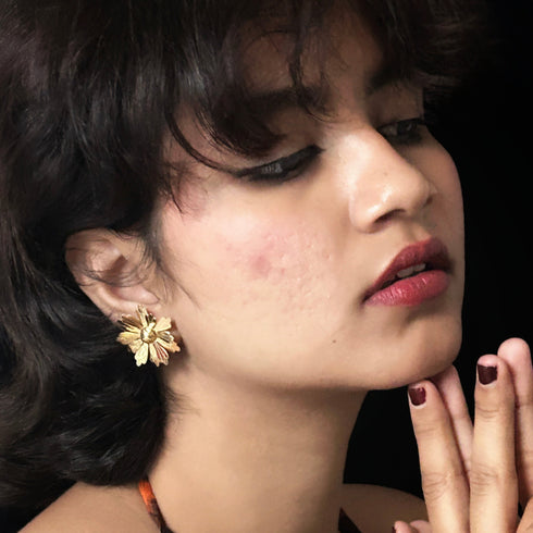 Radiant Daisy-Shaped Gold-Tone Stud Earrings from Trenzify Store.