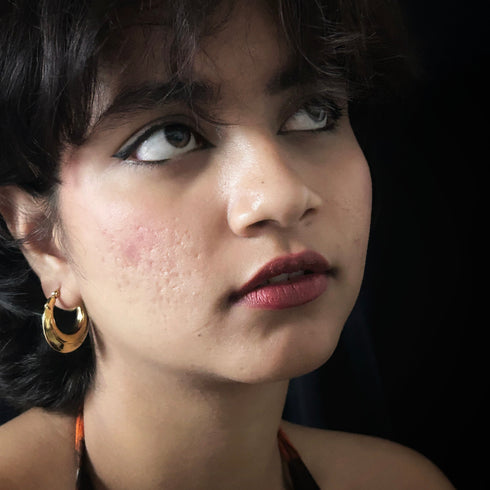 Anti Tarnish Sleek Crescent Hoop Earrings from Trenzify Store.