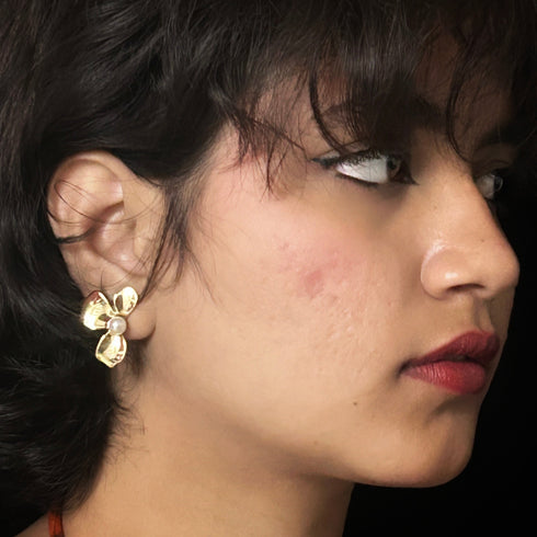 Elegant Floral Pearl Stud Earrings from Trenzify Store.