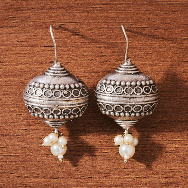 Antique Oxidized Silver Dome Jhumka Earrings with Pearl Drops from Trenzify Store.