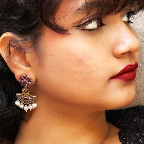 Dual-Tone Temple Drop Earrings from Trenzify Store.
