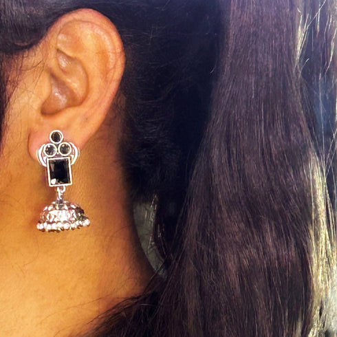 Traditional Silver Jhumka Earrings with Colored Stones & Pearl Drops from Trenzify Store.