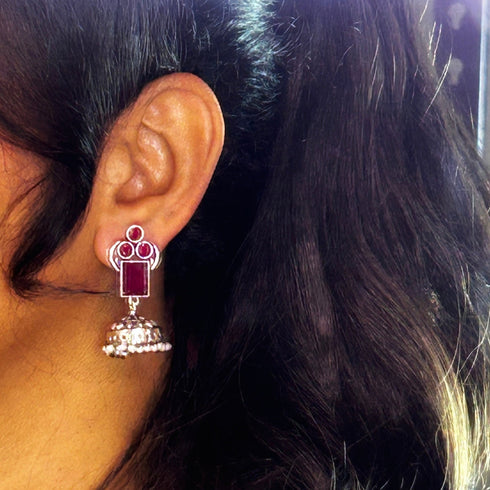 Traditional Silver Jhumka Earrings with Colored Stones & Pearl Drops from Trenzify Store.