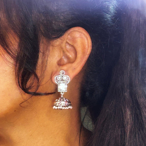 Traditional Silver Jhumka Earrings with Colored Stones & Pearl Drops from Trenzify Store.