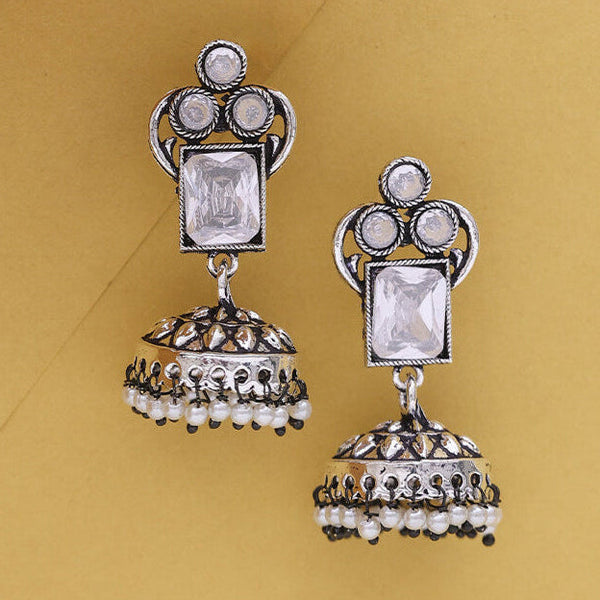 Traditional Silver Jhumka Earrings with Colored Stones & Pearl Drops from Trenzify Store.