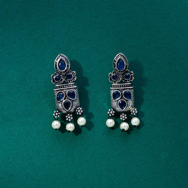 Silver earrings adorned with blue gemstones and pearls, creating a classic, timeless design. From Trenzify Store.
