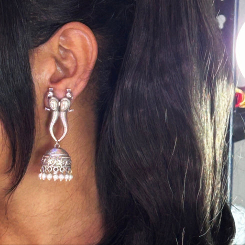 Antique Twin Peacock Jhumka Earrings with Pearl Drops from Trenzify Store.