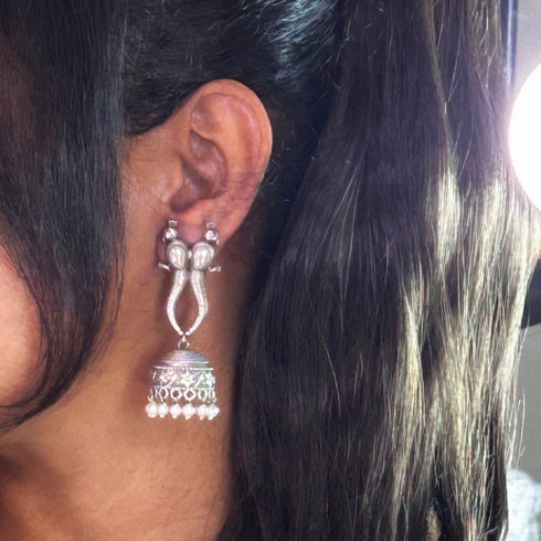 Antique Twin Peacock Jhumka Earrings with Pearl Drops from Trenzify Store.