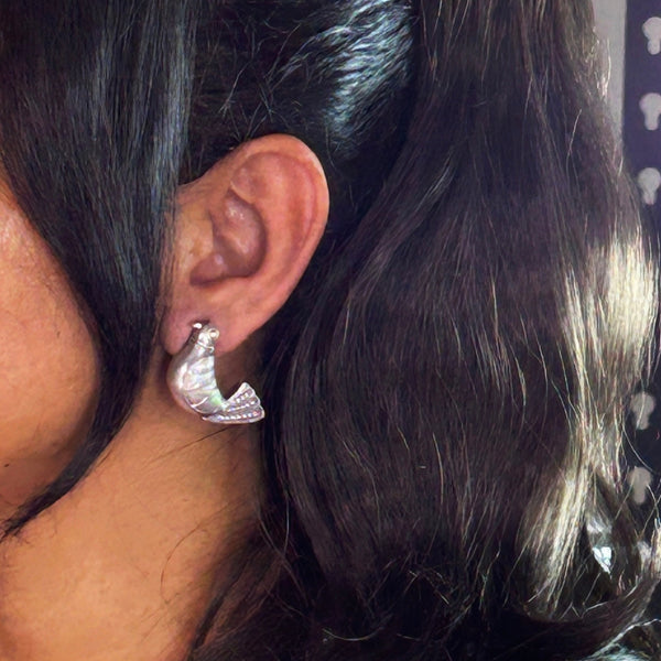 Handcrafted oxidized silver bird-shaped earrings with intricate detailing and antique finish, perfect for adding a unique touch to ethnic or boho outfits. Trenzify Store