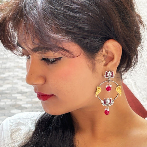 Intricate Bird & Lotus Hoop Earrings from Trenzify Store.