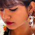 Intricate Bird & Lotus Hoop Earrings from Trenzify Store.