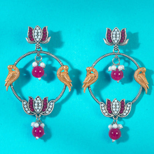 Intricate Bird & Lotus Hoop Earrings from Trenzify Store.