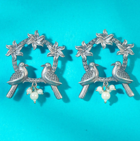 Antique Silver Bird & Floral Hoop Earrings from Trenzify Store.