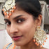 Peach Beaded Kundan Earrings & Maang Tikka Set from Trenzify Store.
