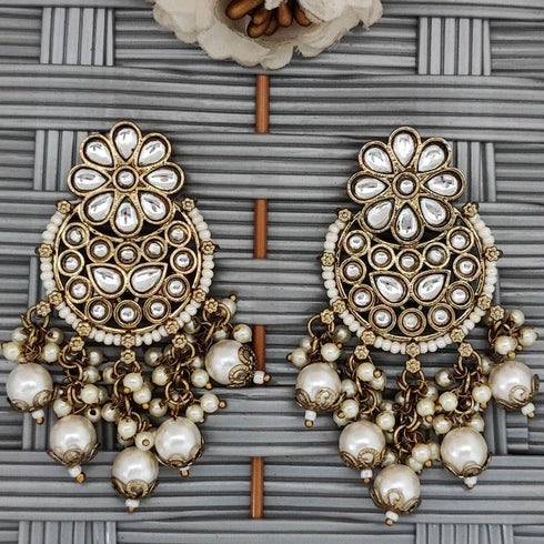 Kundan Pearl Chandbali Earrings from Trenzify Store.