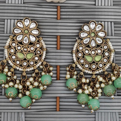 Kundan Pearl Chandbali Earrings from Trenzify Store.