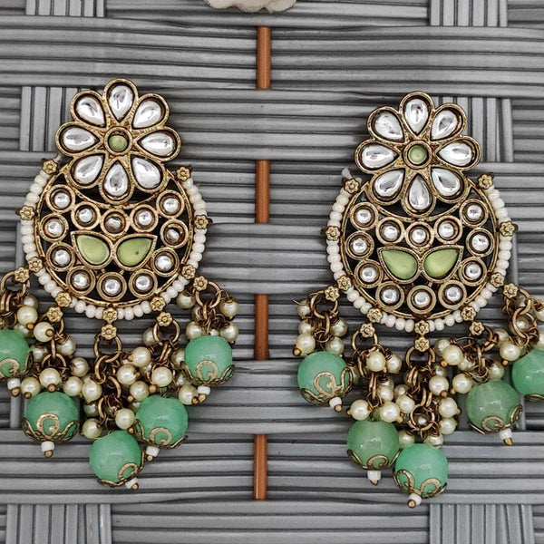 Kundan Pearl Chandbali Earrings from Trenzify Store.