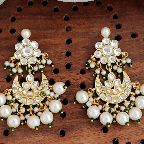 Kundan Crescent Chandbali Earrings from Trenzify Store.