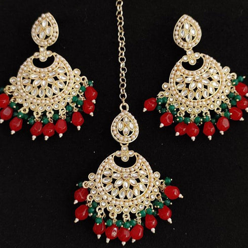 Red and Green Beaded Kundan Earrings and Maang Tikka Set from Trenzify Store.