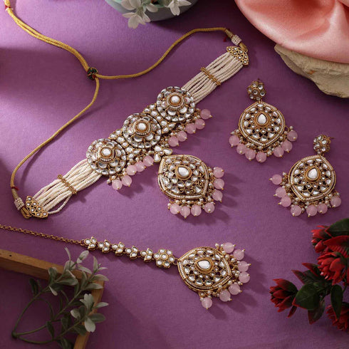 Pink Kundan bridal necklace set with earrings and maang tikka from Trenzify Store
