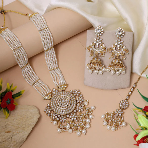 White Kundan bridal necklace set with jhumka earrings and maang tikka from Trenzify Store