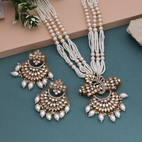 White Kundan pearl necklace set with statement pendant and matching earrings from Trenzify Store