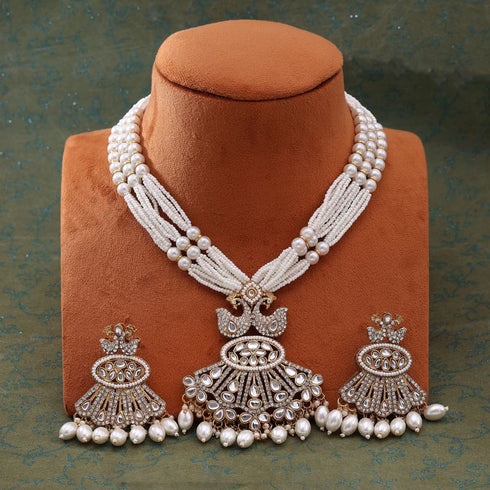 White Kundan pearl necklace set with grand pendant and matching earrings from Trenzify Store