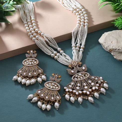 White Kundan pearl necklace set with grand pendant and matching earrings from Trenzify Store