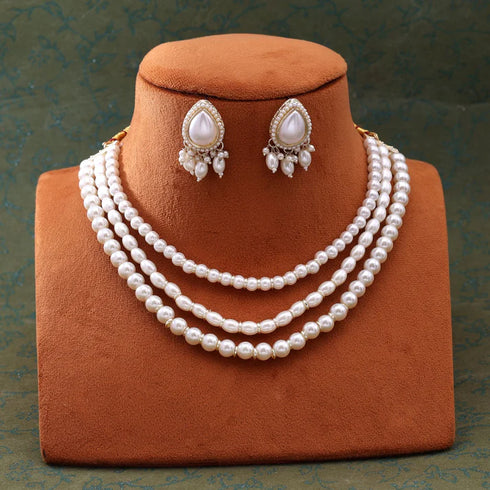 Triple layer pearl necklace set with statement pearl earrings from Trenzify Store