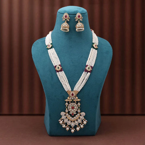 Antique style temple long necklace set with rani and green accents and jhumki earrings from Trenzify Store