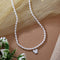 Pearl chain necklace with butterfly charm and silver polish finish from Trenzify Store