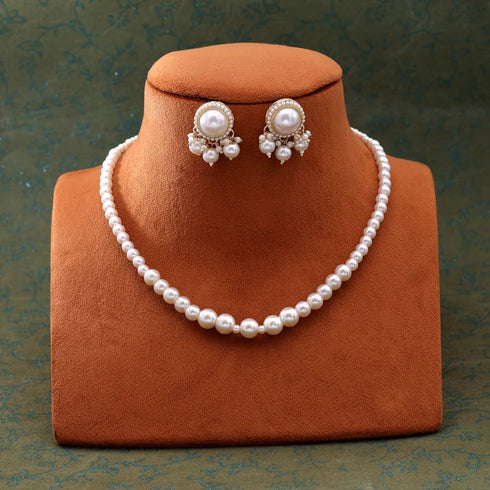 Classic single-strand white pearl necklace set with matching stud earrings from Trenzify Store