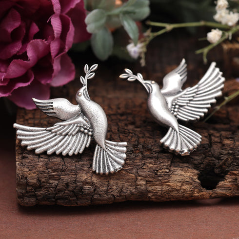 Graceful Dove Motif Oxidised Earrings from Trenzify Store.