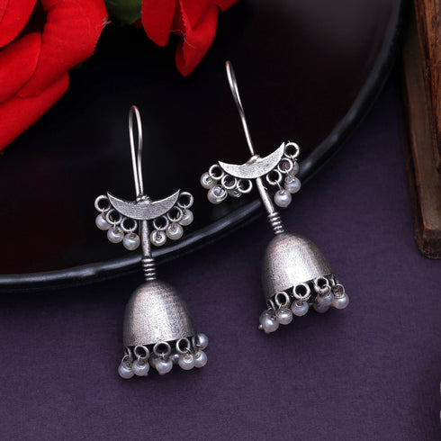 Oxidized jhumka earrings with crescent top and dome base, adorned with pearl drops – traditional ethnic jewelry design from Trenzify Store