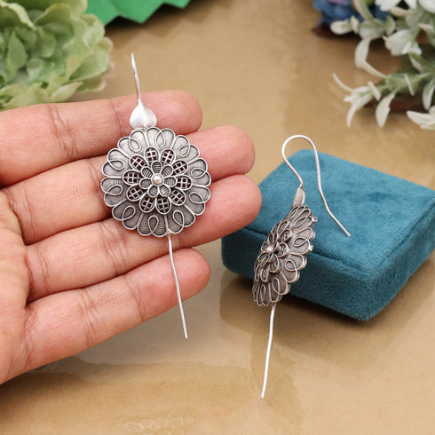 Oxidized silver floral statement earring with intricate cut-out design, handcrafted boho jewelry for women by Trenzify Store.