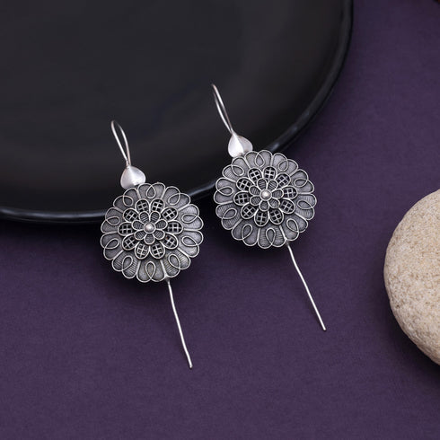 Oxidized silver floral statement earring with intricate cut-out design, handcrafted boho jewelry for women by Trenzify Store.