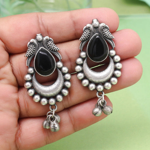 Oxidized earrings with black stone, bird motif, crescent design, and hanging ghungroo bells β ethnic statement jewelry from Trenzify Store.
