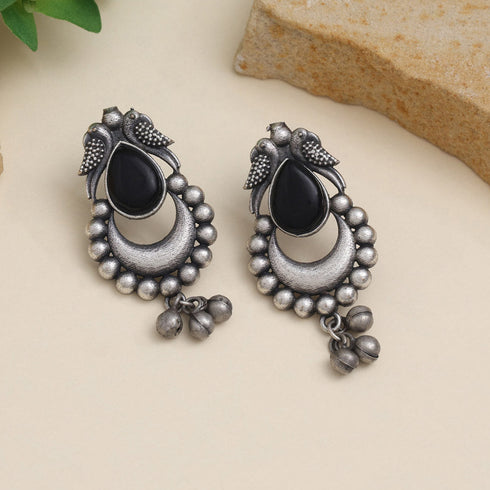 Oxidized earrings with black stone, bird motif, crescent design, and hanging ghungroo bells β ethnic statement jewelry from Trenzify Store.
