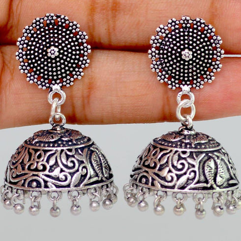 Oxidized Silver Dome Jhumka Earrings with Filigree Detailing from Trenzify Store.